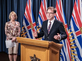 B.C. Premier John Horgan has been more than happy to let "capable people" such as Health Minister Adrian Dix, right, and Provincial Health Officer Dr. Bonnie Henry provide podium updates on the COVID-19 pandemic.