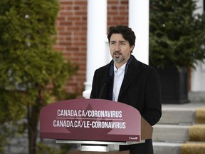 Prime Minister Justin Trudeau speaks during his daily press conference on the COVID-19 pandemic, outside his residence at Rideau Cottage in Ottawa, on Saturday, April 4, 2020.