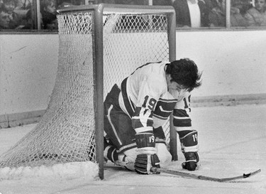 Vancouver Canucks defenseman Dale Tallon sits dejected in the net. Tallon was the Canucks first draft choice in 1970. Ralph Bower/Vancouver Sun