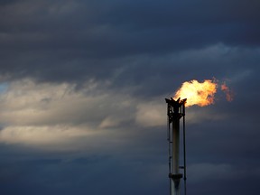 A flare burns off excess gas from a gas plant in the Permian Basin in Loving County, Texas, U.S.