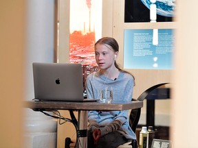 Swedish climate and environmental activist Greta Thunberg is seen during video conversation with Swedish professor and joint director of the Potsdam Institute for Climate Impact Research Johan Rockstrom, who participates from Germany, about courage, solidarity and opportunities in times of crisis, broadcast live to a global audience from Nobel Prize Museum in Stockholm, Sweden, on April 22, 2020.