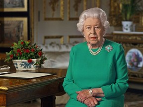 Buckingham Palace handout image of Britain's Queen Elizabeth II during her address to the nation and the Commonwealth in relation to the coronavirus epidemic (COVID-19), recorded at Windsor Castle, Britain, on April 5, 2020.
