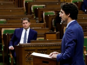 Prime Minister Justin Trudeau speaks in the House of Commons as legislators convene to give the government power to inject billions of dollars in emergency cash to help individuals and businesses the coronavirus outbreak, on Parliament Hill in Ottawa, April 11, 2020.