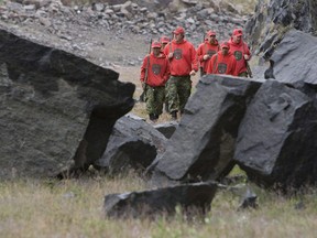 Members of the Canadian Rangers take part in a exercise during Operation Nanook in Iqaluit, Nunavut, Sunday, August 23, 2009. When 40 Canadian Rangers swung into action in northern Quebec this week to set up heated tents for COVID-19 screening and conduct other tasks in their local communities due to the pandemic, they formed the most visible military response to the crisis to date.