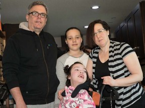 Jocsan Diaz and his wife Carmen Aguilera with their two girls Lucy and Amy. The family has had a difficult time getting groceries delivered during the pandemic due to a lack of available delivery times.