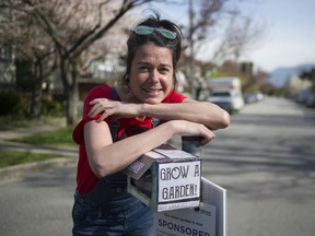 Marie-Pierre Bilodeau from Refarmers.org with the seed sharing bank she set-up near her home on Wall Street in Vancouver.