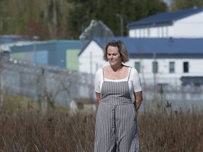 Tracey Norman near the Mission Institution where her brother is a prisoner. She's found it frustrating trying to get information about his health as dozens of inmates contract COVID-19.