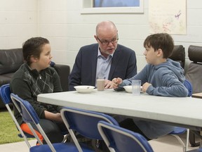 Vancouver Sun Editor-in-Chief Harold Munro speaks to students at James Ardiel Elementary school. The Adopt-A-School fund sent out $97,000 this week to Vancouver community centres, individual schools and other groups feeding hungry children.