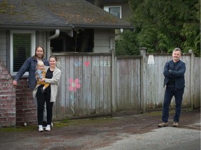 Pete McMartin (right) keeps a suitable spacing, in our social-distancing times, between himself and his daughter Emily McMartin, her husband Brad Felotick and their one-year-old daughter Hazel in their Tsawwassen neighbourhood. Two of McMartin’s children and a daughter-in-law work in health care.