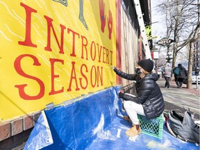 Local artists have stepped up to paint inspiring murals of gratitude on many of Gastown's boarded up storefronts. Abi Taylor paints a mural on the plywood protecting a store that is closed in Gastown during battle against the spread of the COVID-19 virus in Vancouver, B.C, April, 6, 2020.