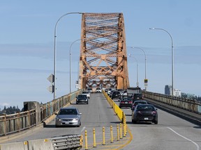 Traffic is considerably lighter than normal and moving freely at 5 p.m. earlier this week on New Westminster's Pattullo Bridge over the Fraser River.