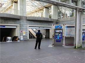 A virtually empty Burrard SkyTrain Station exemplifies drastically reduced transit use in the past month.