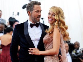 Ryan Reynolds (L) and Blake Lively attend the "Charles James: Beyond Fashion" Costume Institute Gala at the Metropolitan Museum of Art on May 5, 2014, in New York City.
