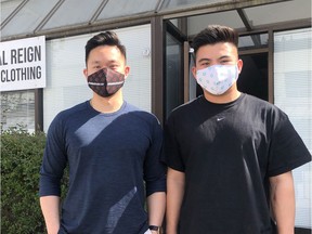 Coastal Reign co-founders Eddison Ng (left), wearing a Columbia Chrysler mask, and Boaz Chan, wearing a Coastal Reign-branded mask.