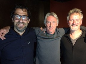 Records In My Life team Charles Brownstein (left) and Mark Henning (right) flank musician Paul Weller, who has been so inspired by the Beatles that his band still walks on stage to their 1966 acid-tinged Tomorrow Never Knows.