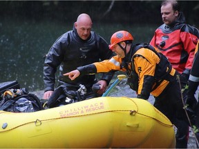 Emergency personnel attend Foley Lake in search of two missing youth on Sunday, May 3, 2020.