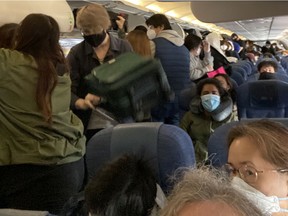 How about that physical distancing? Passengers are packed in on Kathleen Hamilton's May Day Air Canada flight from Toronto to Vancouver.