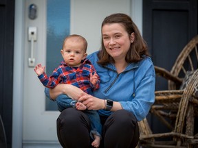 The day before her first Mother's Day as a new mom Maddie Bemrose holds her 8 month-old son Fox at home in Calgary on Saturday, May 9, 2020.