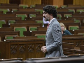Prime Minister Justin Trudeau rises during a sitting of the Special Committee on Covid-19 Pandemic in Ottawa, Wednesday May 20, 2020.