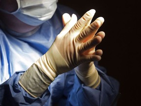 A doctor prepares for a surgical procedure at a hospital in Washington on June 28, 2016.