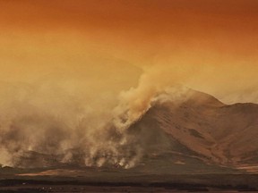 A large wild fire continues to burn in Waterton Lakes National Park, Alta., on September 12, 2017. Federal scientists are predicting a higher than average wildfire hazard for almost the entire country this summer.