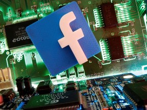 Facebook symbol is seen on a motherboard in this picture illustration taken April 24, 2020.