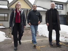 Wet'suwet'en hereditary leader Chief Woos, also known as Frank Alec, centre, Minister of Crown-Indigenous Relation, Carolyn Bennett, left, and B.C. Indigenous Relations Minister Scott Fraser arrive to address the media in Smithers, B.C., on March 1, 2020. Wet'suwet'en hereditary chiefs and representatives of the federal and provincial governments are expected to sign an agreement today that politicians say will rebuild relationships after anti-pipeline protests and blockades earlier this year. But the deal has also fractured an Indigenous community in B.C.'s Interior.