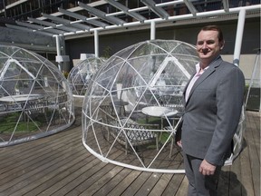 Westin Bayshore general-manager Paul Cannings with geodesic domes set up on the hotel's outdoor pool patio that will help guests isolate.