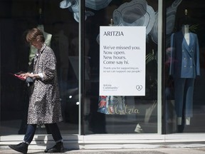 Vancouver, BC: MAY 15, 2020 -- Clothing retailer Aritzia opened their Robson Street location to the public Friday, May 15, 2020, one of the first such businesses to do so in Vancouver, BC. Retailers were hit hard by social distancing rules due to the Covid-19 pandemic.