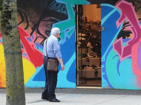 A boarded-up store on Vancouver's Robson Street on May 11 as worried businesses wonder about paying those pre-COVID rents in a different 'new normal' during the pandemic.