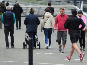 The False Creek seawall near Science World is one of many places where Vancouver pedestrians, joggers and cyclists struggle to keep apart during the Covid-19 pandemic.