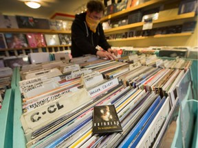 May 20, 2020  - Customer Mike Dowler flips through LP's inside Neptoon Records in Vancouver, B.C., May 20, 2020.  Covid-19 story. (Arlen Redekop / PNG staff photo) (story by ) [PNG Merlin Archive]