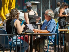 Nearly 300 restaurants, pubs, breweries and cafes are participating in Vancouver's temporary patio program.