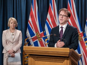 B.C. Health Minister Adrian Dix and Provincial Health Officer Dr. Bonnie Henry talk about the struggle to keep COVID-19 from spreading in B.C.'s long-term care homes on Thursday in Victoria.