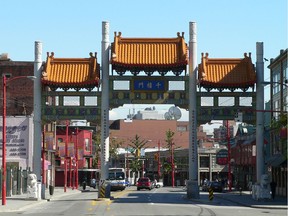 A man was arrested Saturday after police allege the window of a vehicle parked in Vancouver's Chinatown was smashed, terrifying two Asian women inside the car.