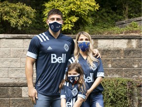 Vancouver Whitecaps striker Lucas Cavallini, his wife Natalia and daughter Briana fashion the face masks the Major League Soccer team is selling, with proceeds supporting the Vancouver Aquarium.