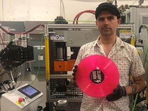 Billy Bones, owner of the Clampdown Record Pressing Plant in Vancouver, and guitarist with the Vicious Cycles.