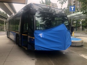 TransLink will be giving away 15,000 branded masks as part of their campaign to make transit safer for riders in the time of COVID-19. Pictured in this handout photo is an oversized novelty mask on a TransLink bus.