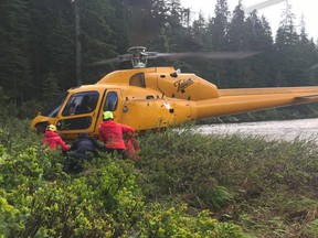 An injured hiker was forced to spend the night at Elsay Lake before being rescued Sunday morning after making contact with search crews.