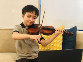 Karen Gerbrecht's student Christopher playing for the camera.