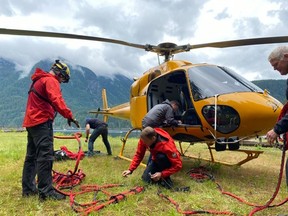 Sustainable funding is on the way for search and rescue groups in British Columbia that are seeing an uptick in calls in the wake of the COVID-19 pandemic. North Shore Rescue crews prepare to go up in a helicopter on Sunday, June 21, 2020 to extract a hiker that become lost while hiking Mount Seymour the day before.