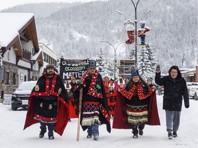Wet'suwet'en Hereditary Chiefs from left, Rob Alfred, John Ridsdale, centre and Antoinette Austin, who oppose the Costal GasLink pipeline take part in a rally in Smithers B.C., on Friday Jan. 10, 2020. The Wet'suwet'en hereditary clan chiefs and their supporters had requested a public investigation into the way the RCMP are controlling access along a rural road in northern B.C.