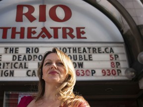 Rio Theatre owner and operator Corinne Lea poses for a photo outside prior to the start of the double bill of Deadpool and Deadpool 2 for a fundraiser to help save the theatre in Vancouver.