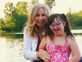 Mary Cardle with her daughter Ainsley, 7, who has autism and Down syndrome.