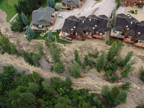This handout aerial photo by the RCMP shows the mudslide in a creek bed at Fairmont Hot Springs. The slide, which occurred July 15, 2012.