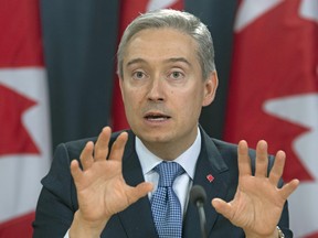 Foreign Affairs Minister Francois-Philippe Champagne responds to a question during a news conference in Ottawa on March 9, 2020.