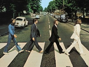 Members of the Beatles, George Harrison, Paul McCartney, Ringo Starr, John Lennon, cross Abbey Road in London, Britain, August 8, 1969. Picture taken August 8, 1969.