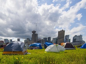 Tents set up in CRAB Park on East Vancouver’s waterfront, along Burrard Inlet, on Thursday.