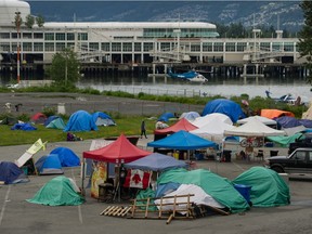 Homeless people are living in tents at CRAB park in Vancouver on June 10.