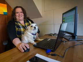 Kirsty Peterson and her dog Alice work at home in North Delta.